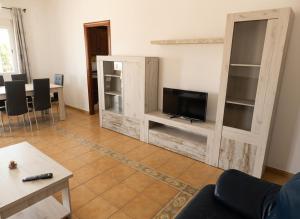 Chalet en la playa con piscina Privada en el Palmar terraza y chimenea