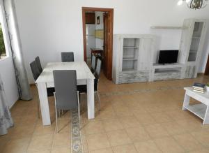 Chalet en la playa con piscina Privada en el Palmar terraza y chimenea