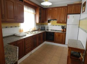 Chalet en la playa con piscina Privada en el Palmar terraza y chimenea