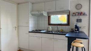 Vrijstaand chalet met hottub en verwarmd zwembad