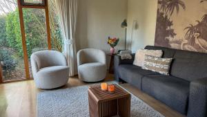 Vrijstaand chalet met hottub en verwarmd zwembad