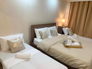 Furnished Family Condo Near IT Park and Waterfront With Pool, Wifi, Gym Access