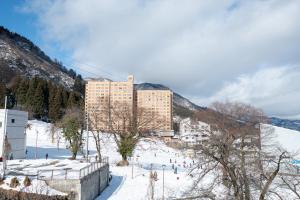 AURA YUZAWA Apartment Hotel - Spacious 1Bedroom Apartment with Large Living Room Sleeps 4 to 6, Bedroom with 2-Double Beds, Living Room with 1-Double Bed & 1-Sofa Bed