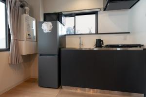 AURA YUZAWA Apartment Hotel - Spacious 1Bedroom Apartment with Large Living Room Sleeps 4 to 6, Bedroom with 2-Double Beds, Living Room with 1-Double Bed & 1-Sofa Bed