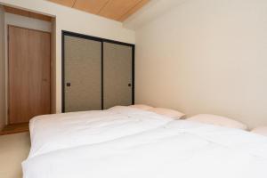 AURA YUZAWA Apartment Hotel - Spacious 1Bedroom Apartment with Large Living Room Sleeps 4 to 6, Bedroom with 2-Double Beds, Living Room with 1-Double Bed & 1-Sofa Bed