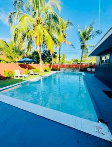 Modern Boho 3BR Duplex Escape with Pool & King Bed Near Beach