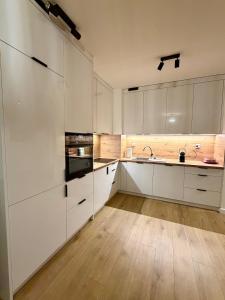 Ferienwohnung Magia Morza in Kolberg Ortsteil Podczele max 4 Personen - Parkplatz - Balkon