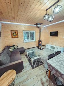 Domek w lesie nad stawem Sauna Balia Podlasie