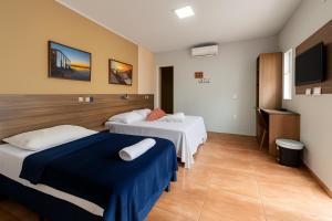 Pousada Queiroz em Frente ao Parque Beto Carrero