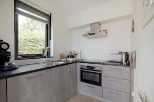 6 - Persoons de Vlaamse Reus 195 Bungalow