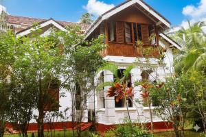 Charlottes Coral Breeze - A Colonial Seaside Bungalow
