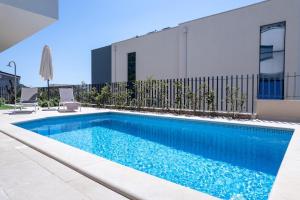 Modern Luxury Retreat with Sea & Mountain Views