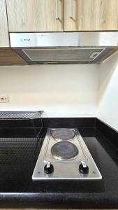 PROMO Modern Boho Chic Condo Near MOA, Manila Bay