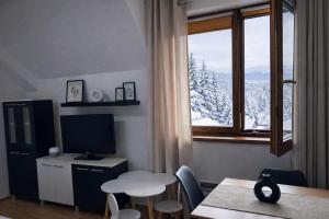 Kamzík Ski Apartment Donovaly - Apartmán 64 hneď pri zjazdovke