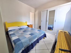 Casa prática e acolhedora na Praia do Santinho