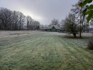 Charming flat with wood stove on a large farm
