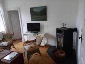 Charming flat with wood stove on a large farm