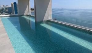 HABITACIÓN Torres Palmas alberca, vista al mar, Roof Top VIP