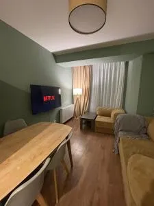 1 Bedroom apartment with lounge-style sofas near the lift