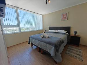 Amplio departamento en pleno centro de Chillán con estacionamiento privado