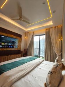 Cozycostays 65Inch TV Omaxe hazratganj