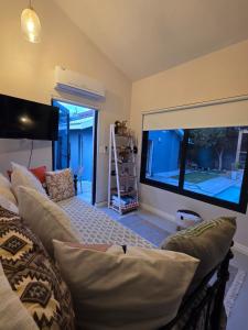 In the heart of Kommetjie, 2 minute walk to beach