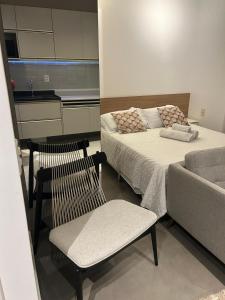 Studio completo com localização privilegiada