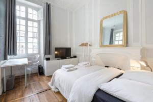 Appartements L'Horloge by Cocoonr : photos des chambres