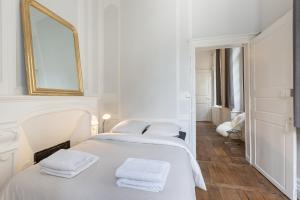 Appartements L'Horloge by Cocoonr : photos des chambres
