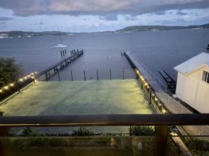 Peaceful Waterfront Retreat with Private Jetty Near Train