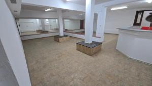Empty Hall Space with Kitchen Bar & 2 Bathrooms - No Beds, No Bedrooms, No Hot Water, Not Suitable for Living Accommodation