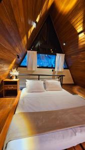 Aframe romântico de luxo na serra Cabana Aguimô