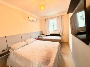 Seu refúgio em Bombinhas, conforto e pé na areia