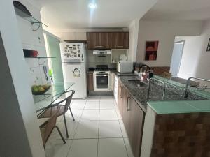 Praia Grande - Costa do Sol pé na areia frente mar