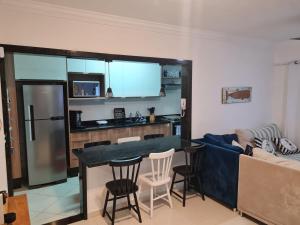 Apto novo pé na areia com piscina