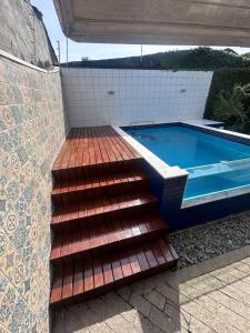 Casa Verde Bertioga, um espaço cheio de charme com três praias - Indaiá, Pedra Selada e Riviera de São Lourenço para visitar a pé!