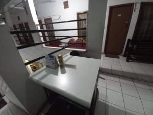 OYO 95096 Dewi Sudirman Guest House