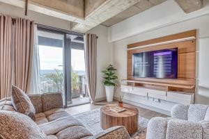 Stylish Sandton Stay with Skyline Views!