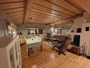Log house with a view and sauna