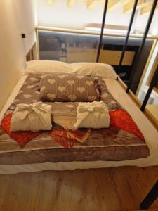 Baita Cornigol ai piedi delle Dolomiti