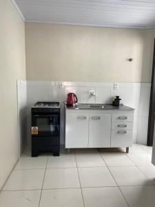 Centro de Tramandaí apto de 2 dormitótios na Av Fernandes Bastos