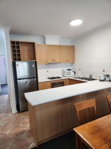 Escape to a Waterfront Apartment with Jetty