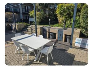 Escape to a Waterfront Apartment with Jetty