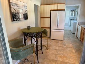 Cool ranch home with heated pool near beach