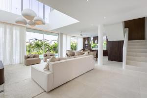 Luxury 3 bed beachside villa with cold plunge pool, rooftop & designer furniture