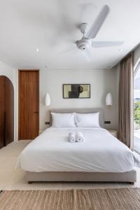 Luxury 3 bed beachside villa with cold plunge pool, rooftop & designer furniture