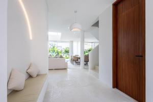 Luxury 3 bed beachside villa with cold plunge pool, rooftop & designer furniture