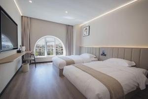 칭다오 / 청도 Warminside Hotel 호텔 스위트룸