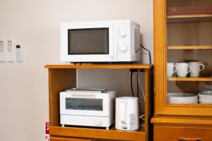 浜の宿後楽庵-閑静な住宅街に佇む日本庭園付きの落ち着いた宿-歩いて後楽園へ-駐車場無料