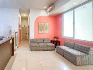 Sans Stay Olive Tree Surabaya